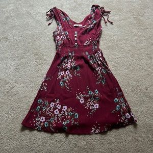 Dress is from aeropostale! Maroon color and an xs in size!